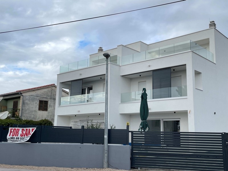 Takvåningar i nybyggnad med takterrass - bild på skalstatus.