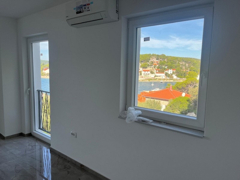Rum med luftkonditionering och havsutsikt