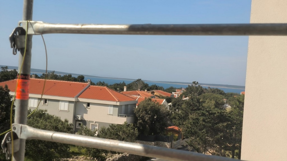 Havsutsikt från en oavslutad lägenhet, höjdpunkt för fastighet i Kroatien