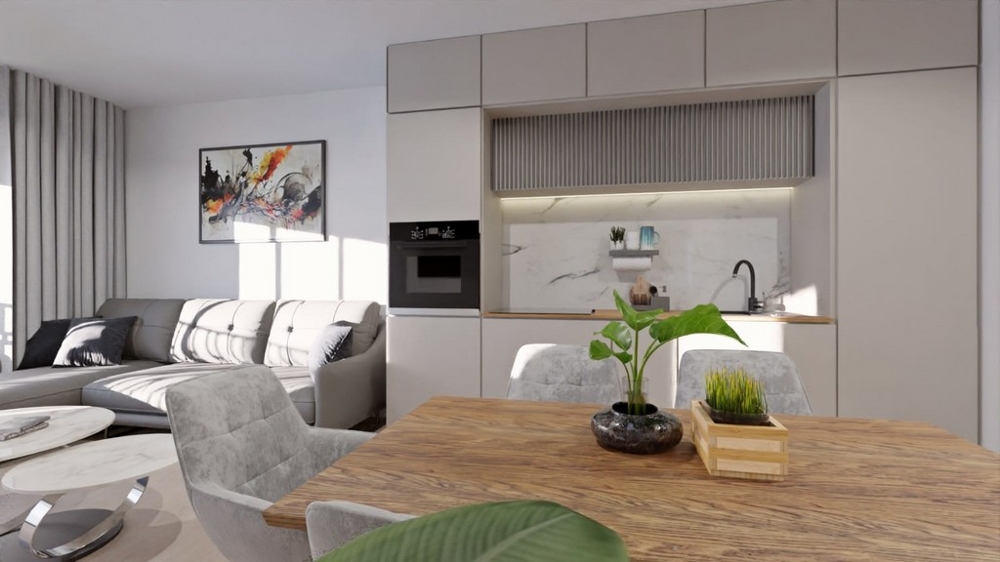 Öppet kök-vardagsrum med mysig matplats och modern inredning.