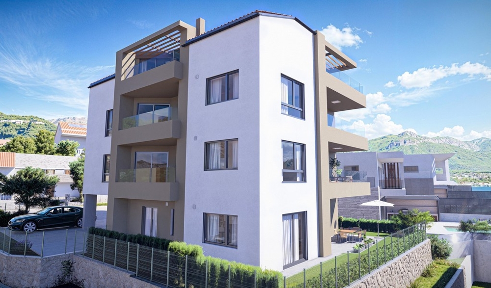 Balkongutsikt med havsutsikt och utsikt över angränsande vita hus med röda tak. Panoramaspaning, köper lägenhet i Kroatien