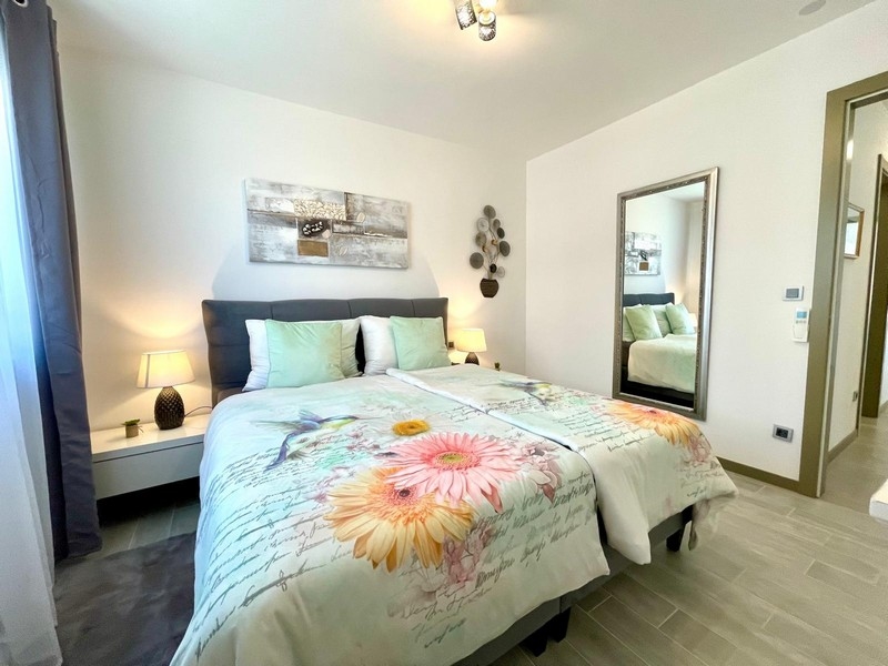 Ytterligare ett sovrum med en bekväm säng.