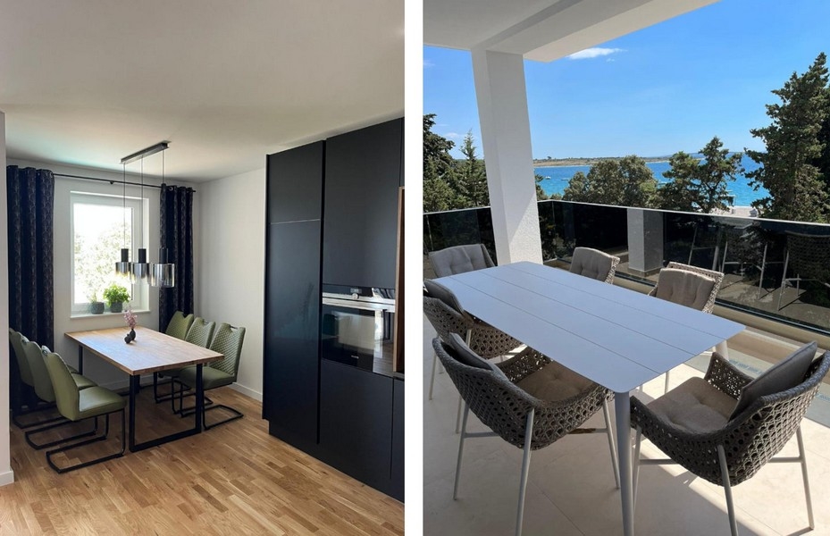 Matplats och kök samt utsikt över terrassen med havsutsikt.