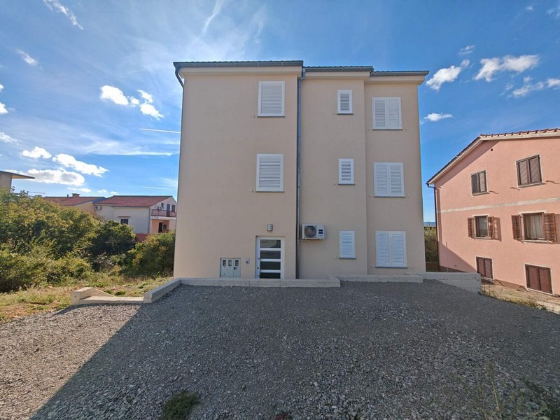 Baksidan av den nya byggnaden där lägenhet A3512 ligger.