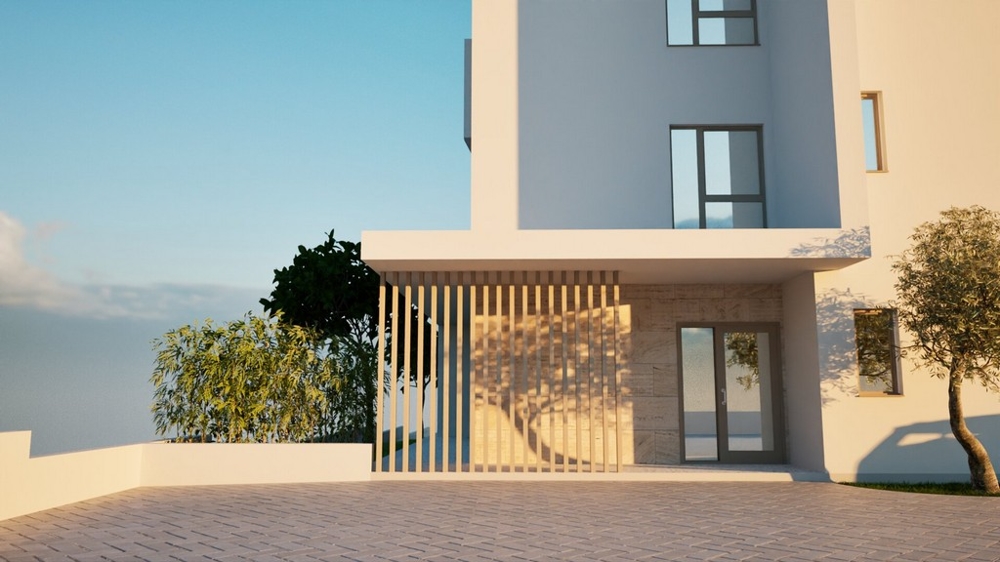 Parkeringsplatser och entréområde till fastighet A3577.