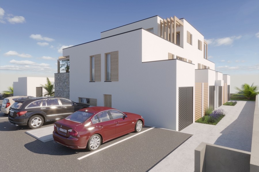 Parkeringsplatser framför den moderna nya byggnaden A3615 i Privlaka i Kroatien.