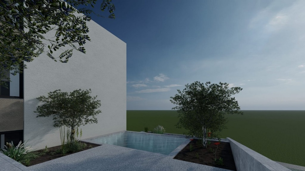 Modernt poolområde med grönska på bostadshuset