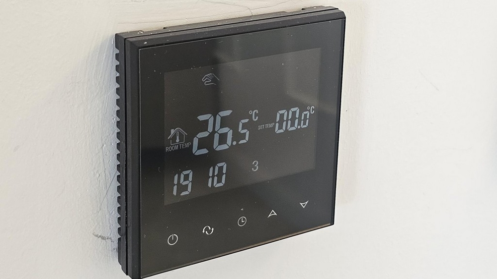 Digital väggtermostat för rumstemperatur