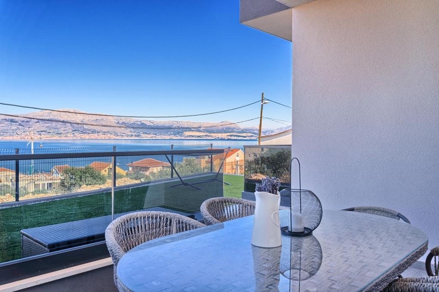 Lägenhet med trädgård nära havet till salu i Kroatien - Panorama Scouting A3720.