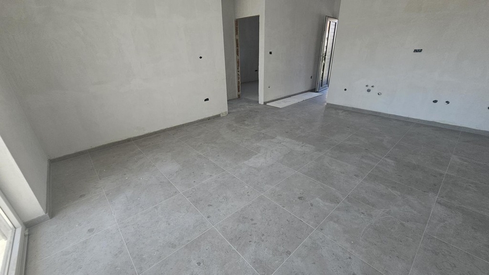 Kök-vardagsrum i den nya lägenheten i Soline