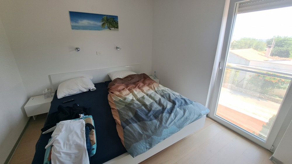 Sovrum med tillgång till balkong