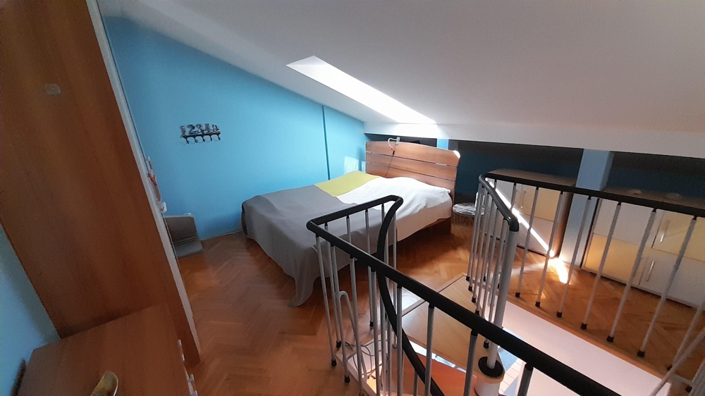 Ytterligare ett sovrum på vinden med gallerikänsla