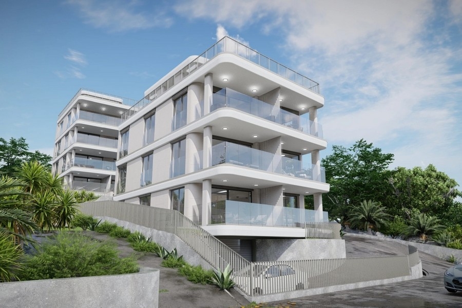 Arkitektoniskt modern byggnad med rena linjer och havsutsikt