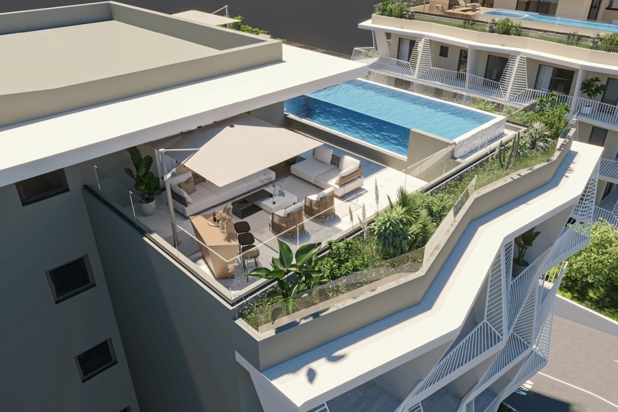 Modern takterrass med pool och havsutsikt