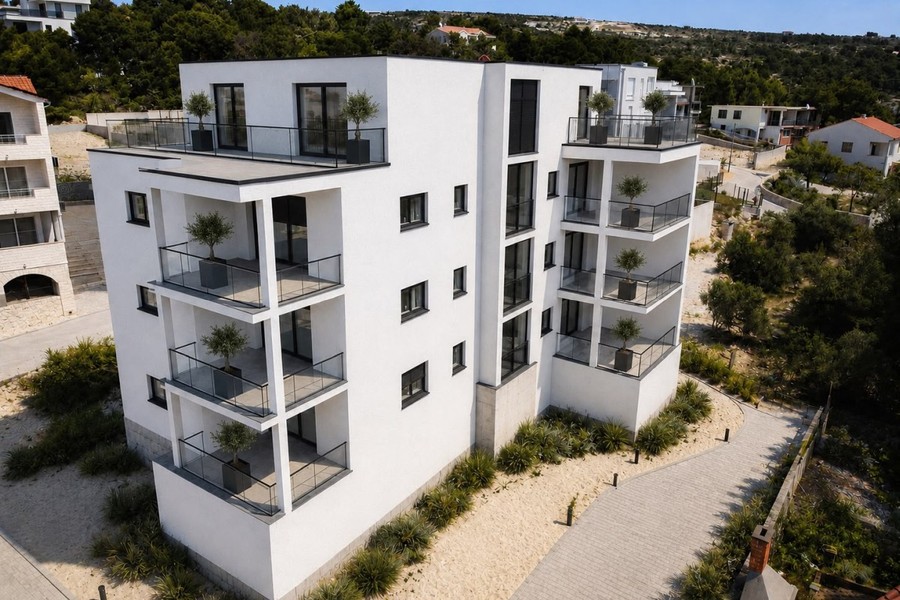Visualisering av det färdiga bostadshuset med balkonger