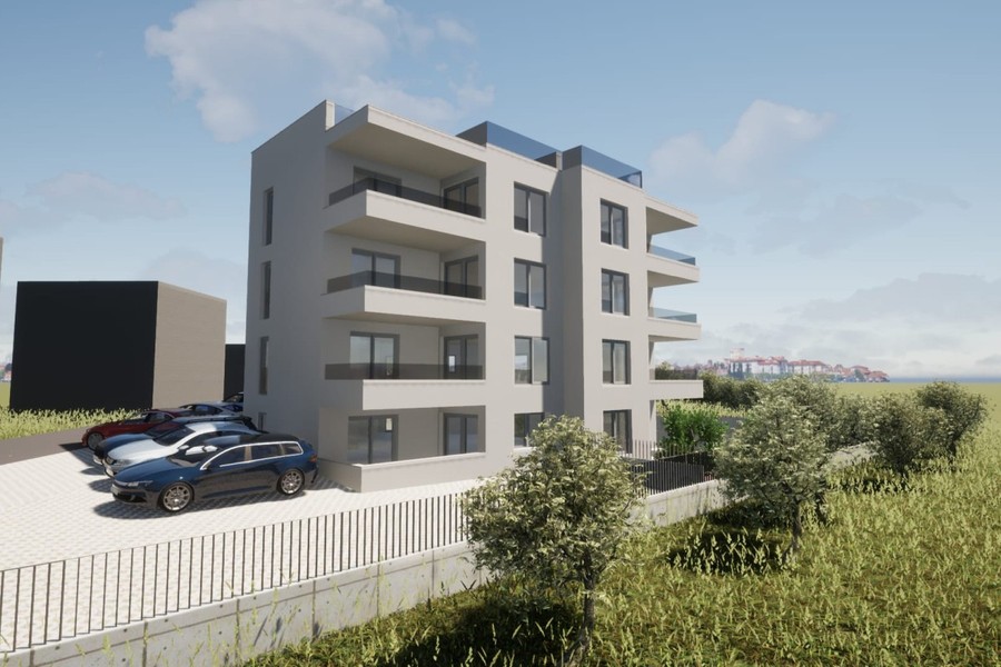 Sidovy av bostadshuset med balkonger