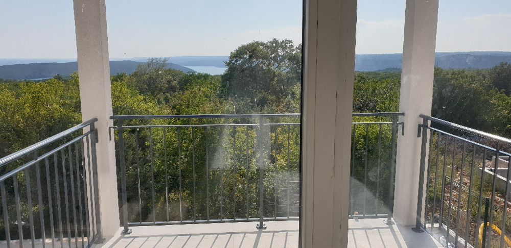 Köp ett nytt stenhus med havsutsikt och pool i Istrien - Panorama Scouting GmbH.