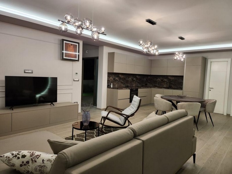 Vardagsrum - 3D-visualisering med lyxig inredning.