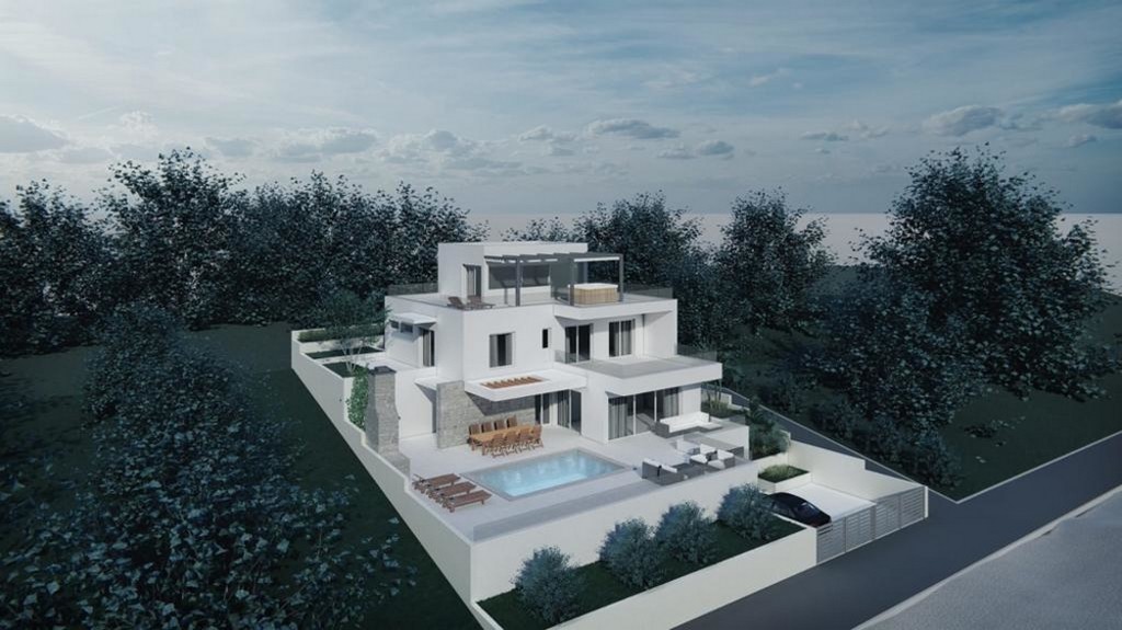 Villa med garage och parkeringsplatser