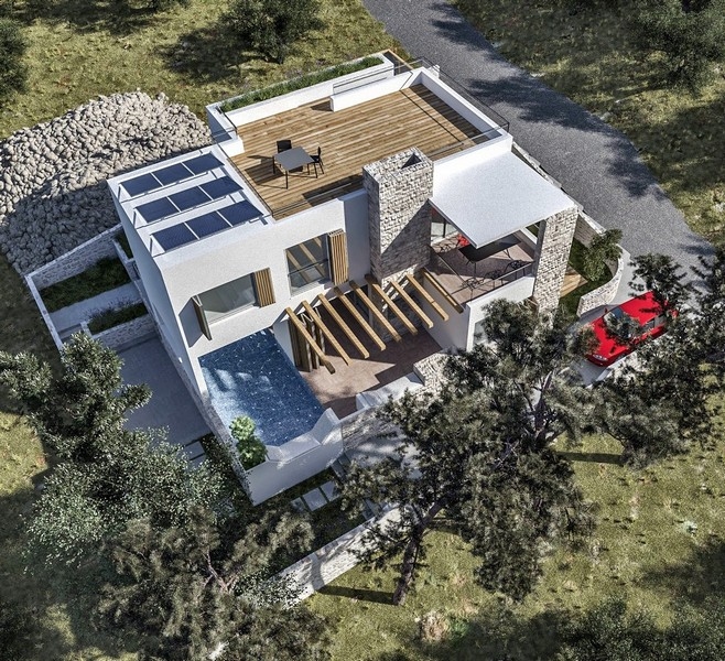 Byggfasen av en villa till salu på den kroatiska ön Krk, med orange tegelväggar och betongkonstruktioner