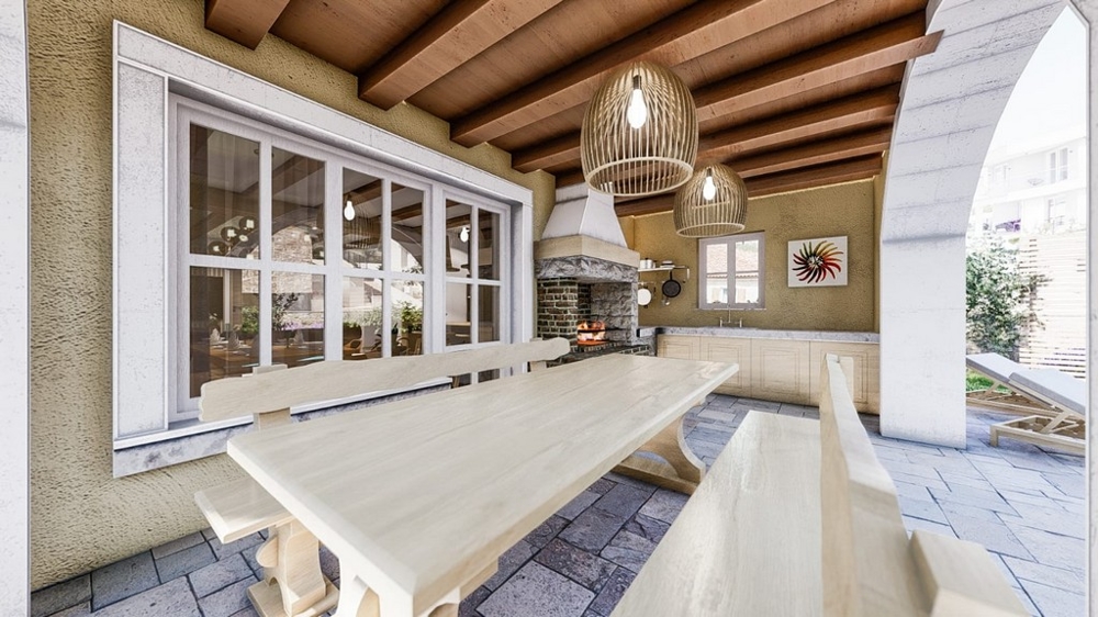 Täckt utomhusterrass med matbord i en medelhavsvilla på ön Krk