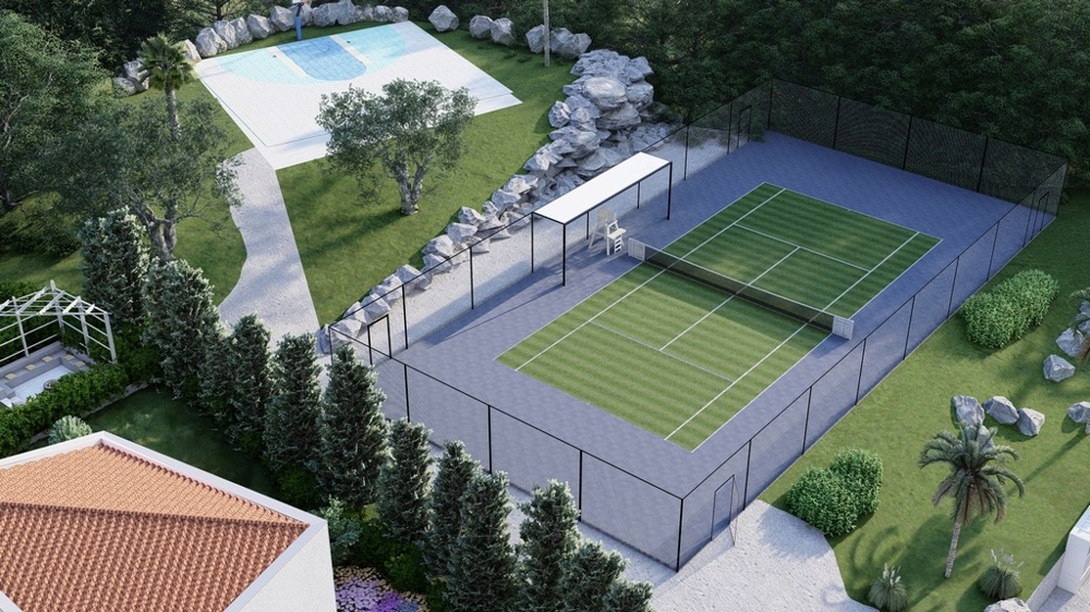 Villakomplex med tennisbana och gröna omgivningar