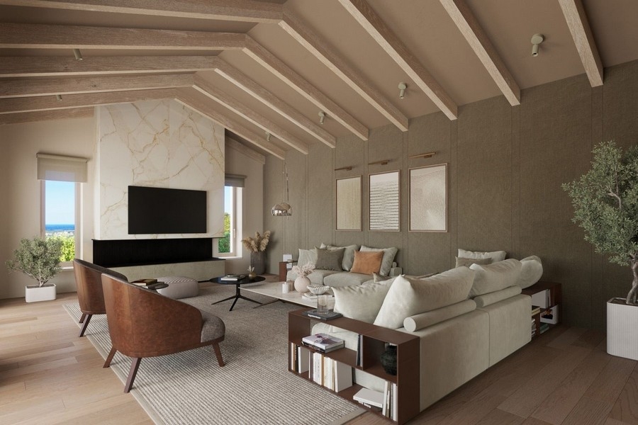 Snyggt vardagsrum med öppen spis och havsutsikt