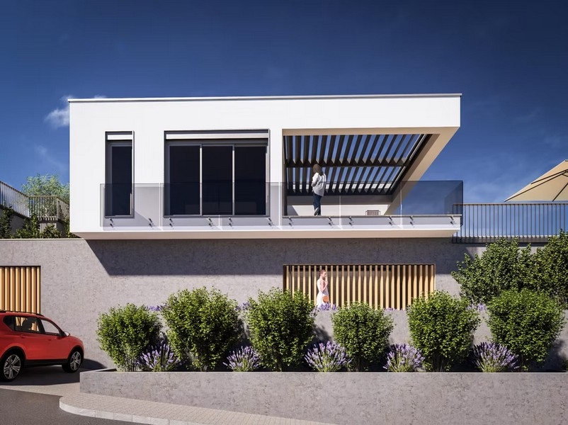 Ny byggnad med terrass och glasräcken