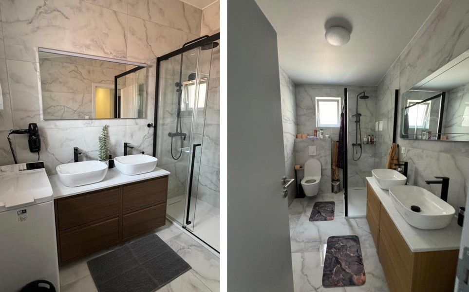 Modernt badrum med dusch och dubbla handfat