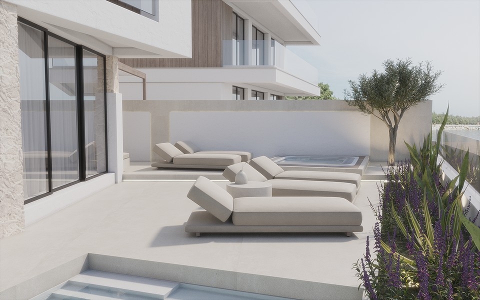 Terrass med moderna solstolar.