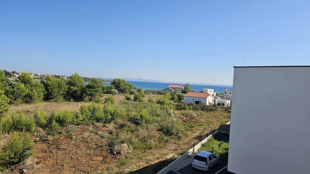 Havsutsikt från balkongen på nybyggda villa H3778 nära stranden i Privlaka.