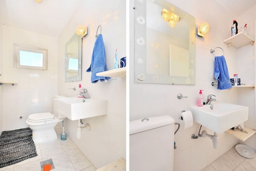 Badrum med handfat och toalett