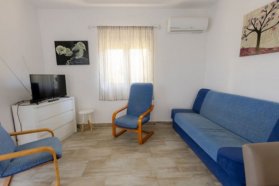 Vardagsrum med soffa och sittgrupp i Kroatien