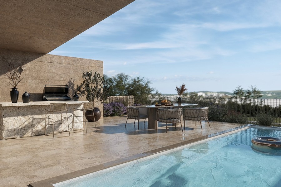 Pool och terrass med utsikt över havet