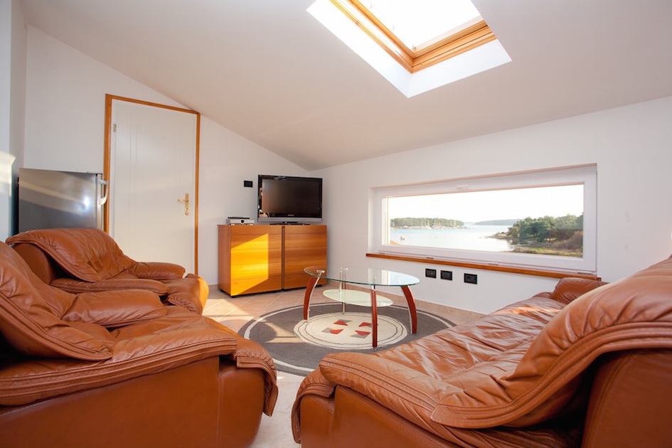 Lägenhet i villan på översta våningen.